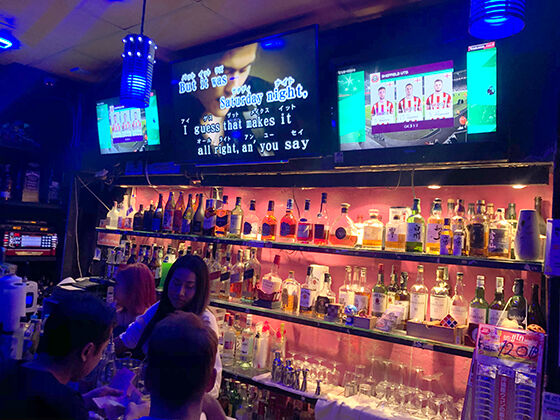 Inside Woodball Thonglor during karaoke night